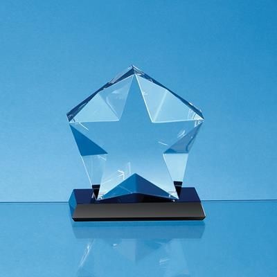 10CM x 4CM OPTICAL CRYSTAL FACETTED STAR MOUNTED ON AN ONYX BLACK BASE