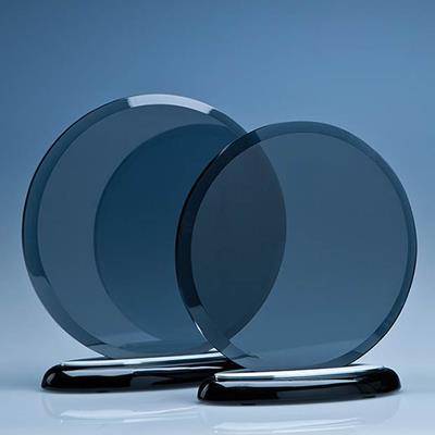 19CM x 10MM SMOKED GLASS CIRCLE ON a BLACK PIANO FINISH BASE; SKILLET: INC; PRESENTATION BOX: PB60